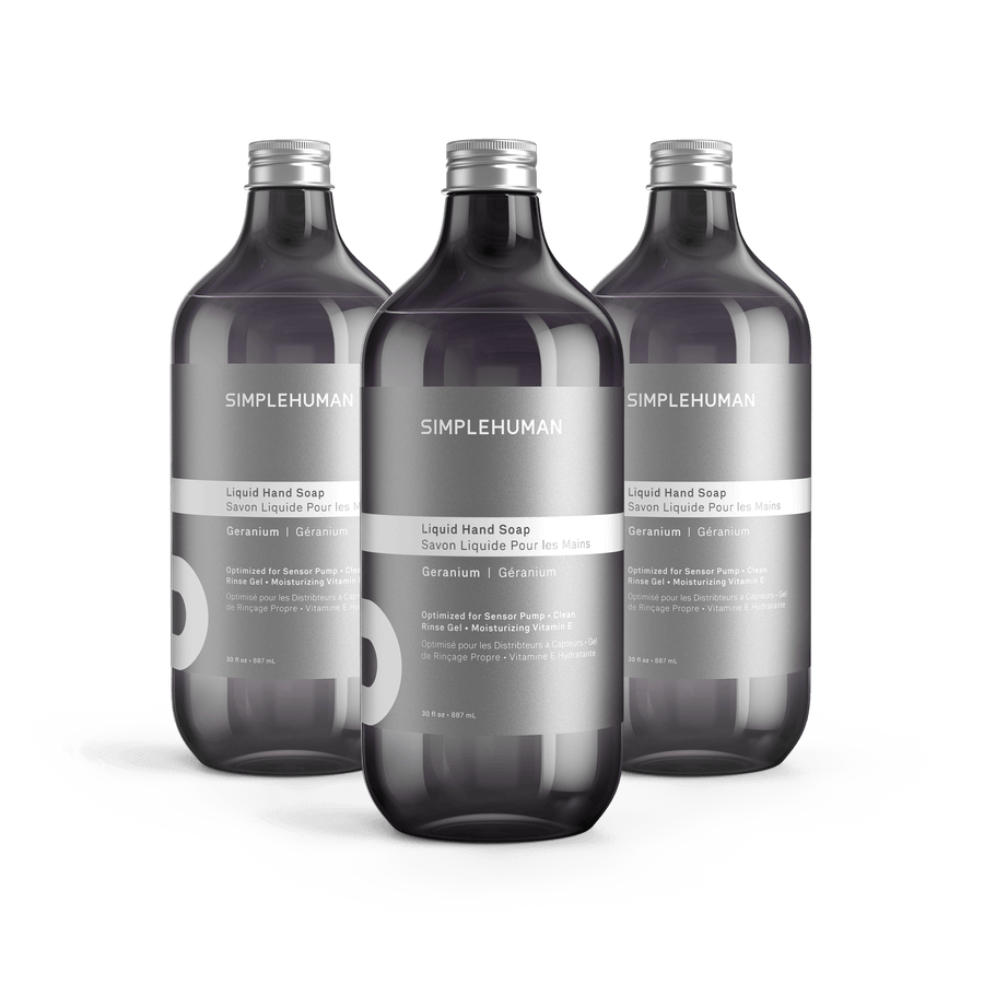 Simplehuman's Geranium Liquid Hand Soap in 3 charcoal colored bottles and titanium caps.