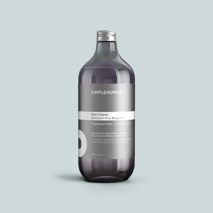 Simplehuman's Fragrance Free Bath Cleaner Refill Bottle on a colored background.
