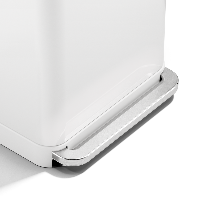 Detail view of Simplehuman 55L Rectangular Step Can in White, showing the durable stainless steel foot pedal for hands-free operation.