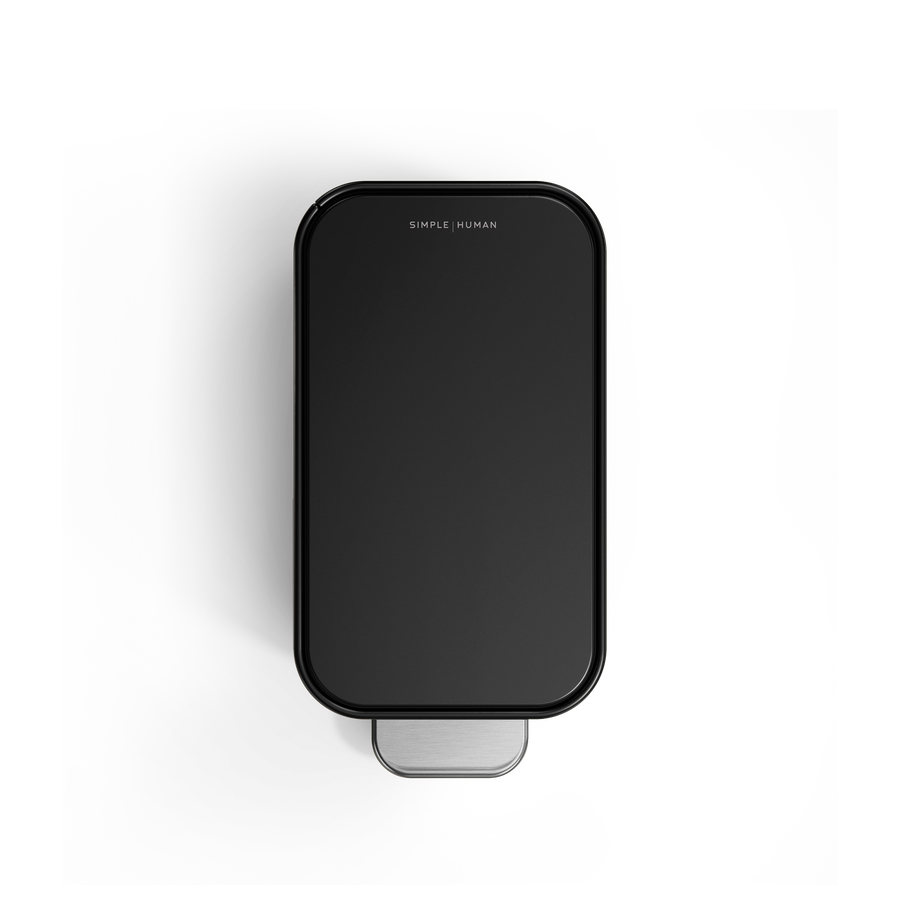 Simplehuman 5L Slim Step Can, Top view, Matte Black, showcasing narrow profile and stainless steel pedal.