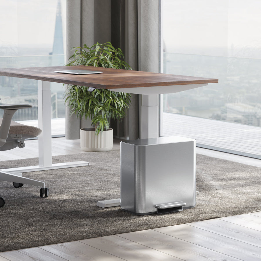 Simplehuman 15L Mini Recycler Step Can, Brushed Stainless Steel, under desk in office, compact hands-free operation.