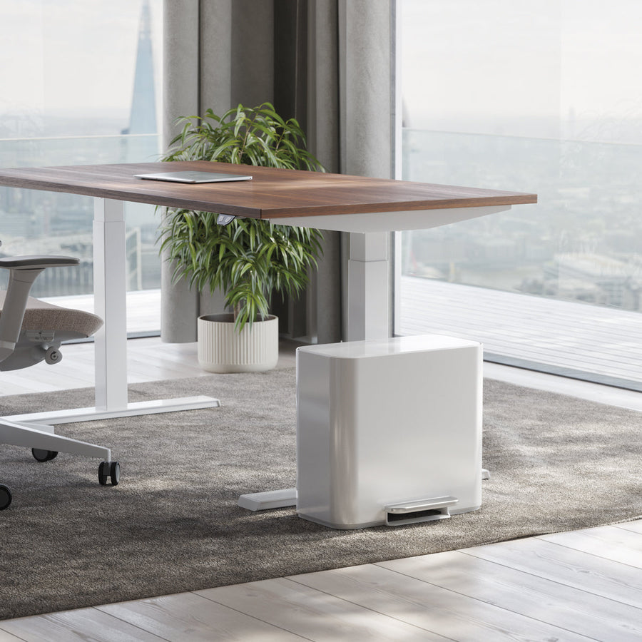 Lifestyle view of Simplehuman 15L Mini Recycler Step Can in White, space-saving for office recycling.
