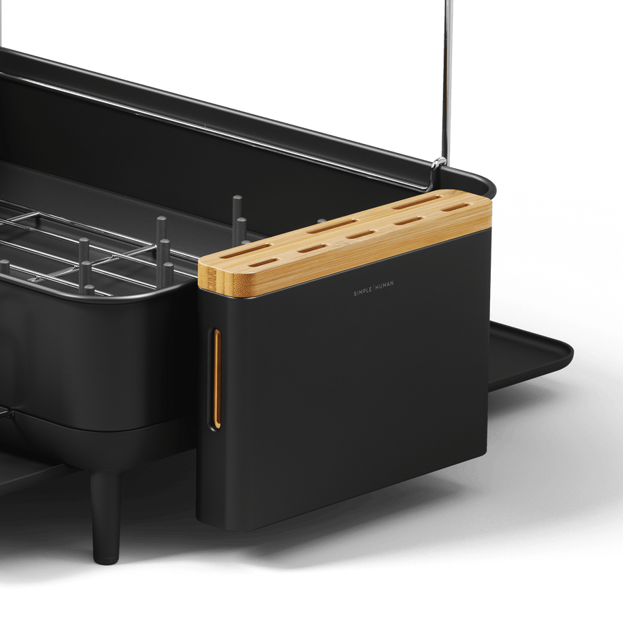 Simplehuman Matte Black Knife Block with Bamboo top, detail showing vertical side window for the removable drip tray.