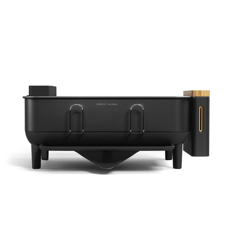 Front view of Simplehuman Matte Black Knife Block showing utensil hooks, removable caddy (Bamboo top), and drip funnel.
