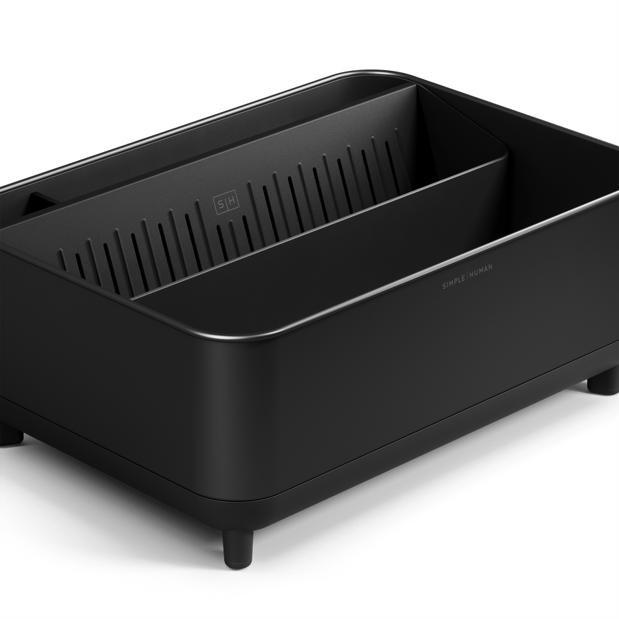 Close-up of Simplehuman Matte Black Bottle Dock showing interior drying tray and rack supports.