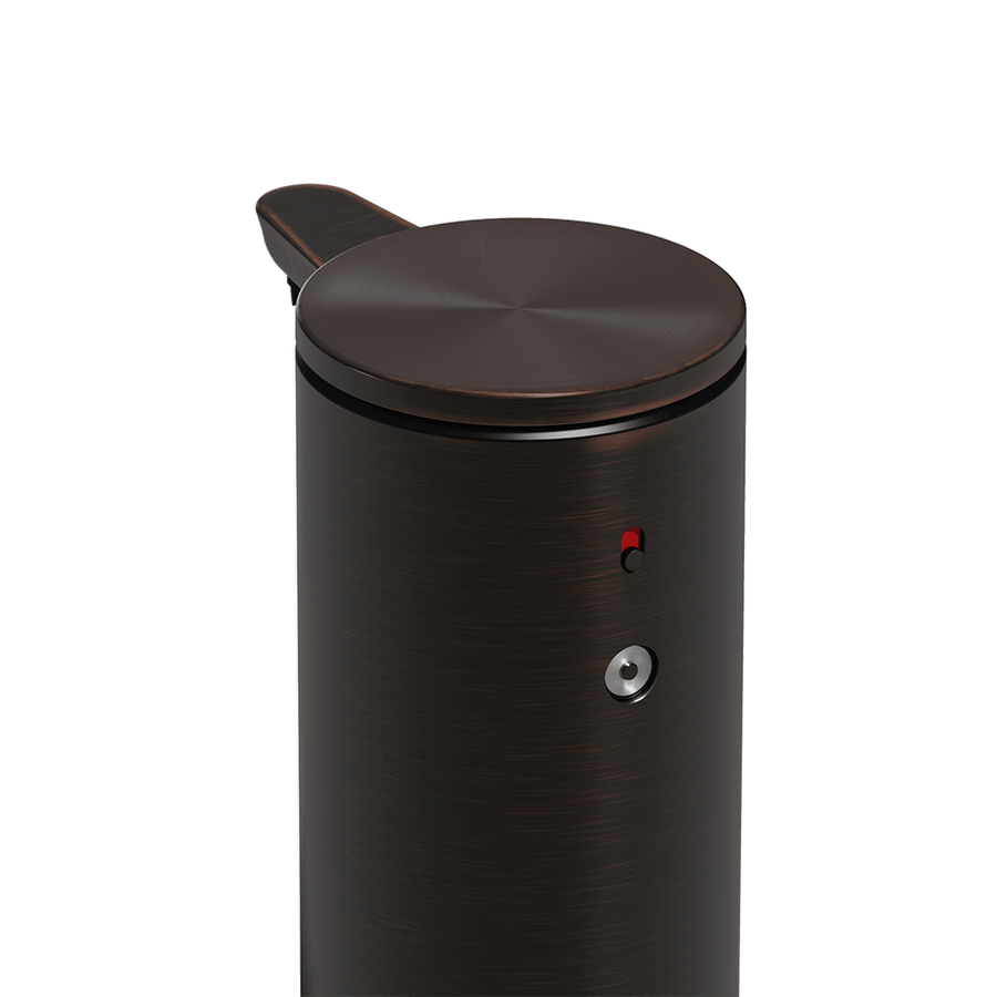 High-angle detail view of Simplehuman 9 oz. Rechargeable Sensor Pump (Dark Bronze), showing dosage control and power indicator.