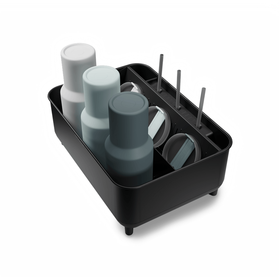 Simplehuman Matte Black Bottle Dock holding reusable bottles, straws, and lids.