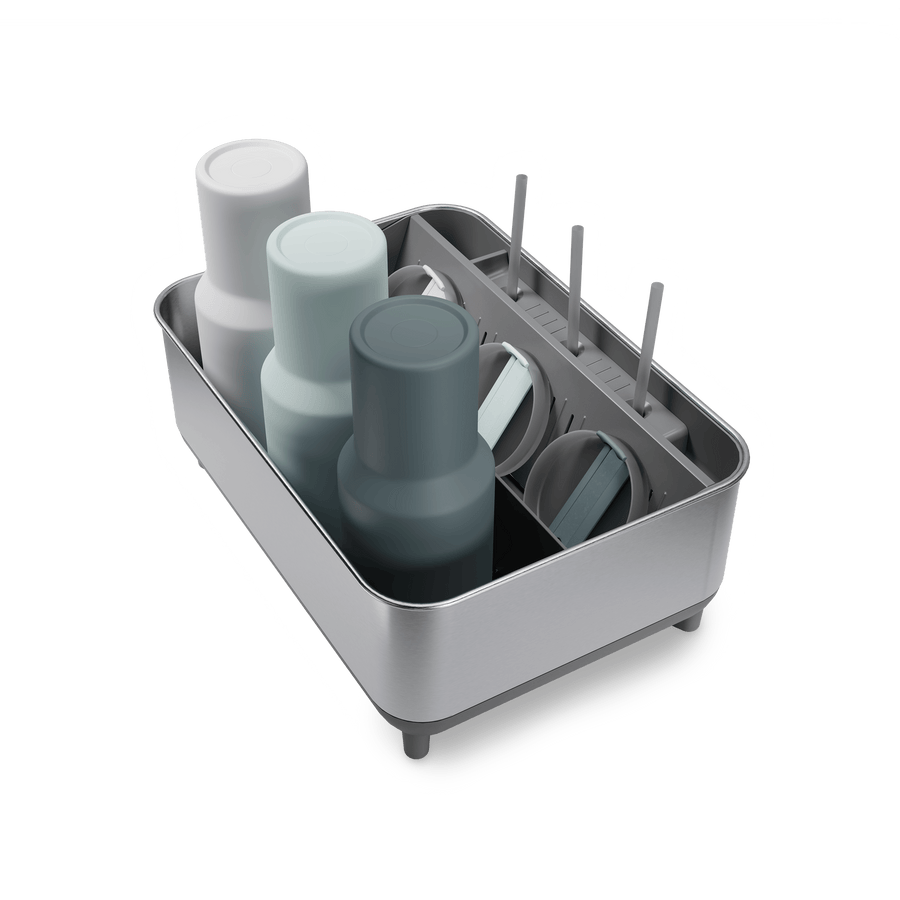 Simplehuman Brushed stainless steel Bottle Dock holding reusable bottles, straws, and lids.