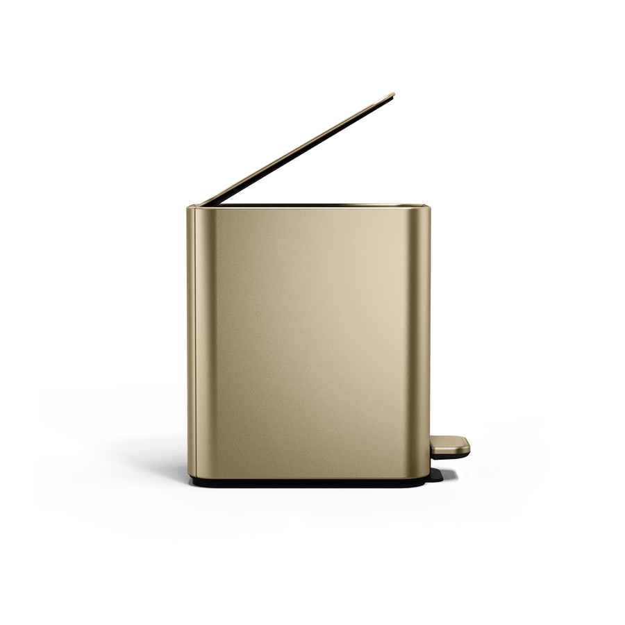 Simplehuman 5L Slim Step Can in Brass, open view, hands-free foot pedal operation.