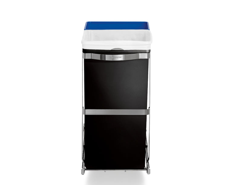 Simplehuman Angled view 35L Dual Compartment Under Counter Pull-Out Can, Polished Stainless Steel frame, trash/recycle. Concealed in your cabinet for a clutter-free kitchen.