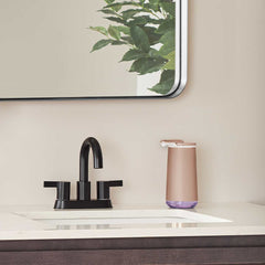 foam sensor pump - rose gold finish - lifestyle pump on bathroom sink image
